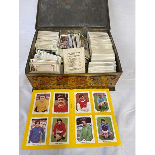 1057 - A mixed box of cigarette and tea cards to include Player's Navy Cut sailor card, Ogden's Jockeys 193... 