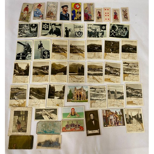 1057 - A mixed box of cigarette and tea cards to include Player's Navy Cut sailor card, Ogden's Jockeys 193... 