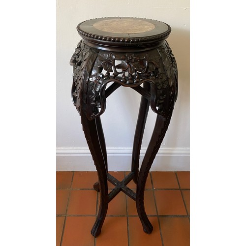 757 - Floral and foliate carved Chinese hardwood stand with marble top on 4 legs. 92cm h x 20cm d at top.