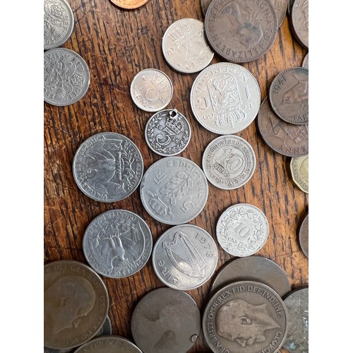 662 - A collection of mostly One Shilling and Sixpence coins dating before 1947 and other coins and Reichs... 