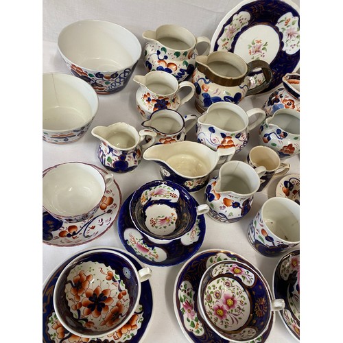 357 - A collection of Gaudy Welsh ware to include cups and saucers, jugs, various sizes and shapes, plates... 