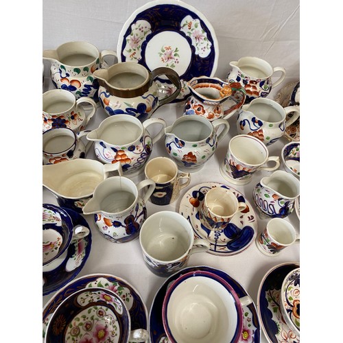 357 - A collection of Gaudy Welsh ware to include cups and saucers, jugs, various sizes and shapes, plates... 