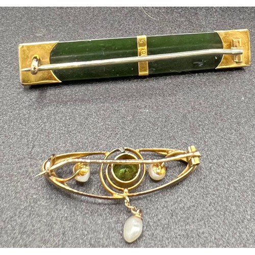 606 - A 9ct gold topaz and seed pearl brooch. 1.7gm together with an agate brooch mounted in 9ct gold.