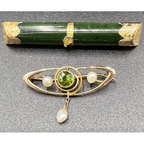 606 - A 9ct gold topaz and seed pearl brooch. 1.7gm together with an agate brooch mounted in 9ct gold.