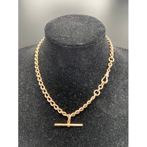 611 - A 9ct gold chain necklace with T bar. Length approx. 42cm. Total weight 35.3gm.