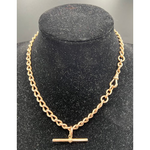 611 - A 9ct gold chain necklace with T bar. Length approx. 42cm. Total weight 35.3gm.