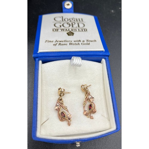 615 - Glogau gold drop earrings set with garnet. 3.8gm. In original box.