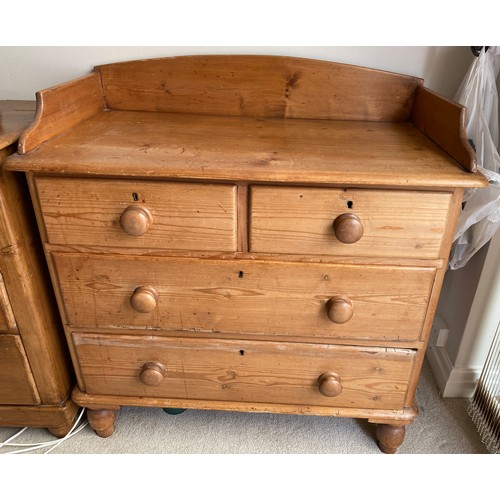 136 - Pine chest of 2 short over 2 long drawers with galleried back and wooden knobs. 94 h x 90 w x 46cm d... 