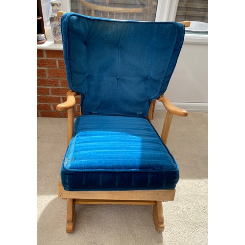 138 - A mid century pale beech rocking chair. 88 h x 70cm w.