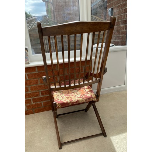 139 - A 19thC folding armchair with fabric seat. 96 h x 48cm w.