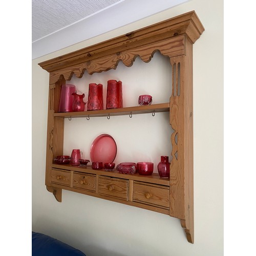 147 - A pine wall rack with 4 small drawers to base. 92 w x 92 h x 12cm w. (glass not included)