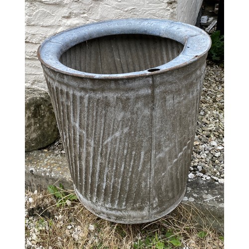 204 - A galvanised dolly tub inscribed 'Non Splash' and 'Soap' to the top rim. 53 h x 49cm diam.