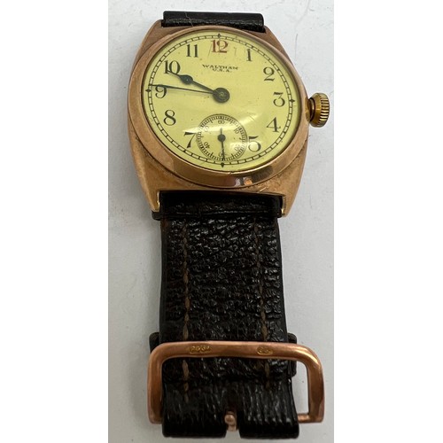 914 - A 9ct gold gentleman's Waltham U.S.A. wristwatch with 9ct gold buckle to strap. Total weight 32.7gm.