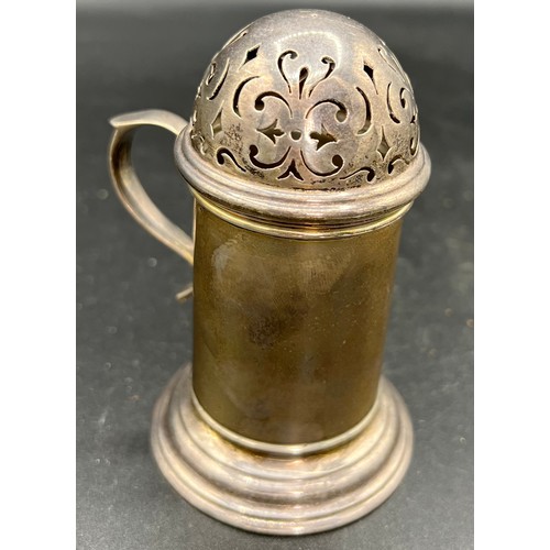 873 - Silver sugar shaker London 1911 maker Mappin and Webb. 11cm h. Weight 106gm.