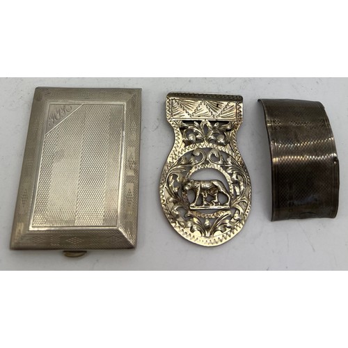 803 - A silver match book cover with engine turned engraving and initialled to corner together with a deco... 