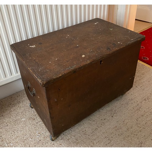 77 - A 19thC pine box with metal handles to sides.