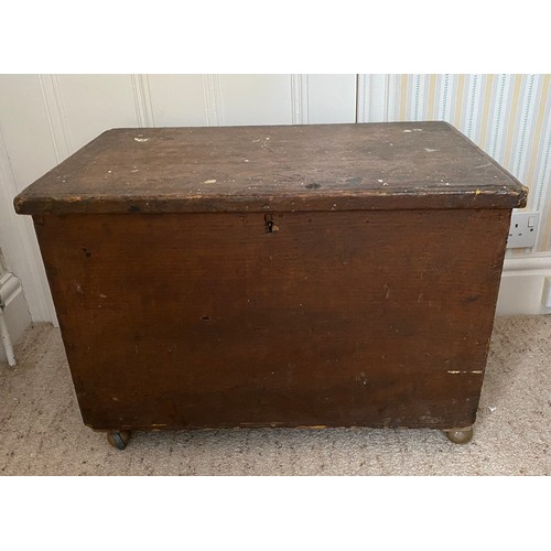 77 - A 19thC pine box with metal handles to sides.