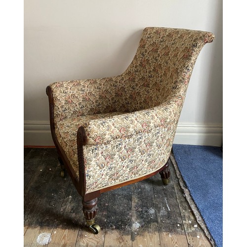 82 - A Regency mahogany framed armchair in the manor of Gillows of Lancaster and London on brass castors.... 