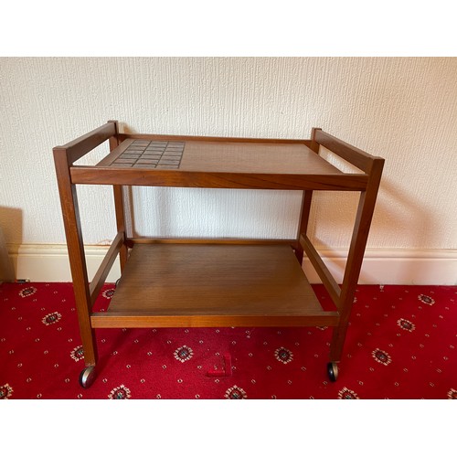 86 - A mid 20thC teak and tiled trolley. Made in Denmark.