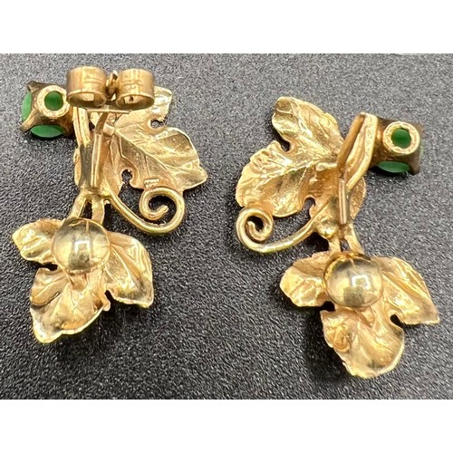 569 - Yellow metal leaf earrings set with jade. Test as 18ct gold. 3.5gm. 25mm l.