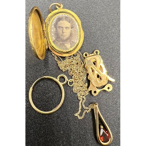 571 - Oval locket with anchor to front, tests as 15ct gold with 9ct gold clasp, 9ct sleeper earring and 9c... 