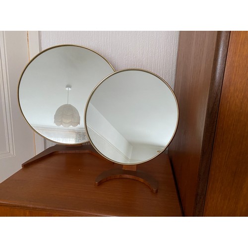 1149 - Two mid 20thC circular mirrors on teak bases. Largest height 49 x 41d , smaller 39 h x 29cm d.