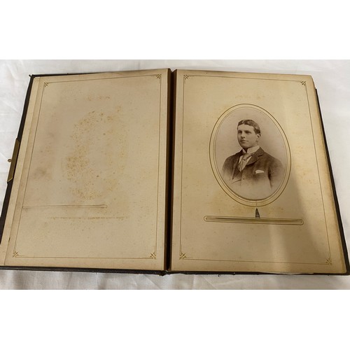 1061 - Two Victorian family photograph albums one with some coloured pages both with photographs of people ... 