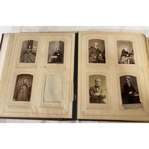 1061 - Two Victorian family photograph albums one with some coloured pages both with photographs of people ... 