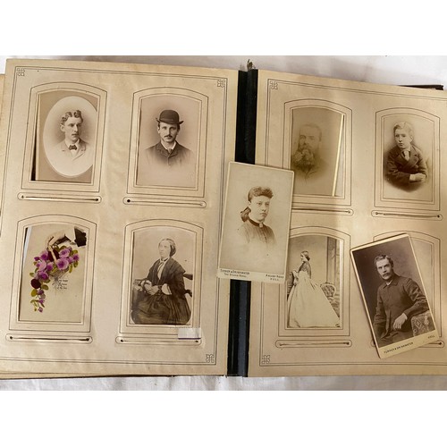 1061 - Two Victorian family photograph albums one with some coloured pages both with photographs of people ... 