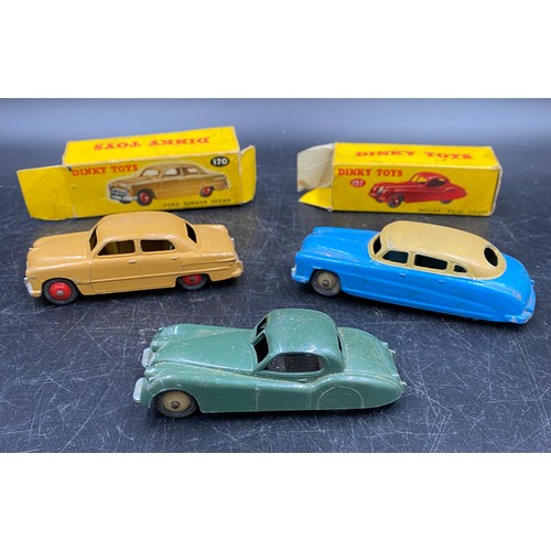 980 - Three Dinky toys to include Jaguar XK120 Coupe 157, Ford Sedan 170 (both boxed), and a Hudson Sedan.