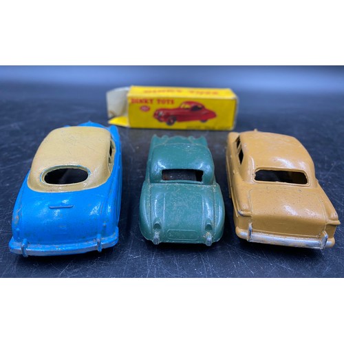 980 - Three Dinky toys to include Jaguar XK120 Coupe 157, Ford Sedan 170 (both boxed), and a Hudson Sedan.