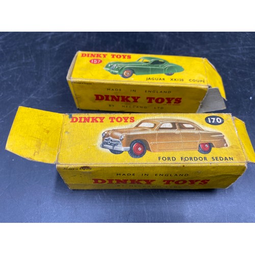 980 - Three Dinky toys to include Jaguar XK120 Coupe 157, Ford Sedan 170 (both boxed), and a Hudson Sedan.