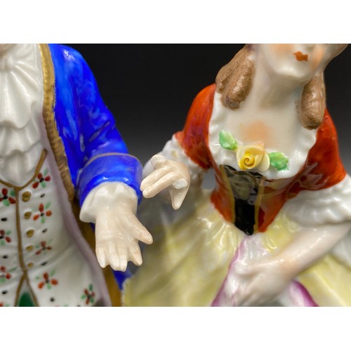 212A - Four Sitzendorf figurines to include courting couple 14.5cm h etc together with a Capodimonte figuri... 