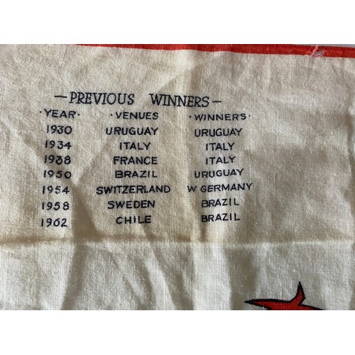 714 - A 1966 World Cup commemorative handkerchief depicting WC Willie kicking a ball over an image of Wemb... 