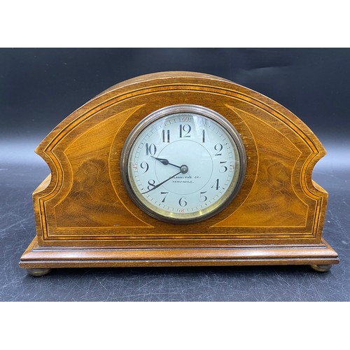 1029 - Mahogany Mantel clock by Goldsmith's Co. of Newcastle 17cm h x 27cm w x 8.5cm deep. Made in France. ... 