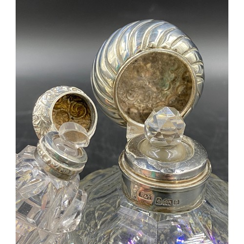 812 - Two cut glass perfume bottles, one with silver decorative top Birmingham 1902 maker Hilliard & Thoma... 