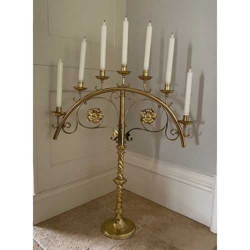 937 - A pair of large brass Gothic Revival candelabra (bought from Libertys London) 79 x 65cm w.