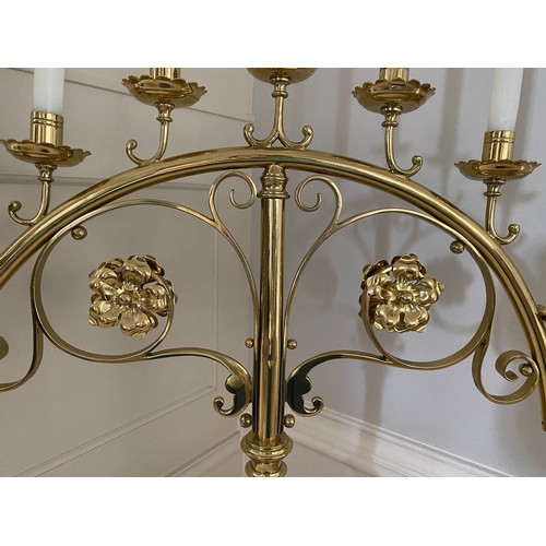 937 - A pair of large brass Gothic Revival candelabra (bought from Libertys London) 79 x 65cm w.