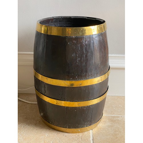 210 - Coopered oak barrel. 48.5 h x 30cm d.