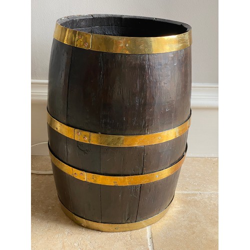 210 - Coopered oak barrel. 48.5 h x 30cm d.