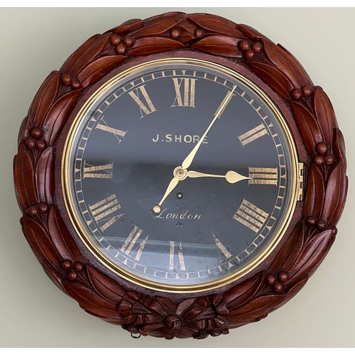 1031 - Modern circular wall clock J. Shore London to face, Laurel decoration to surround. Face 31cm d.