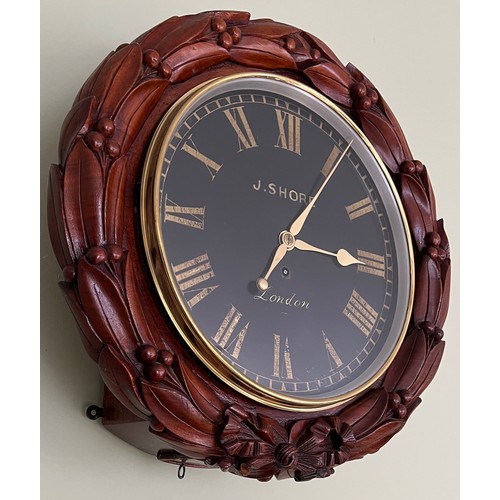 1031 - Modern circular wall clock J. Shore London to face, Laurel decoration to surround. Face 31cm d.