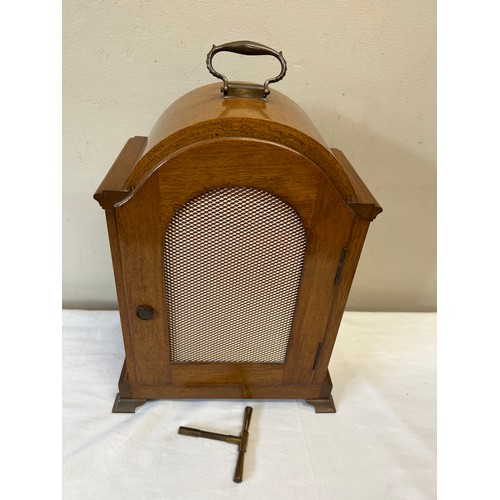 1032 - Mahogany cased Elliot of London mantle clock, retailed by Carmichaels Hull with metal feet and carry... 