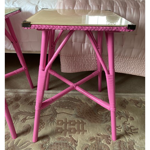 93 - Two fuchsia pink glass top tables. 69 h x 44.5 x 45.5 cm.