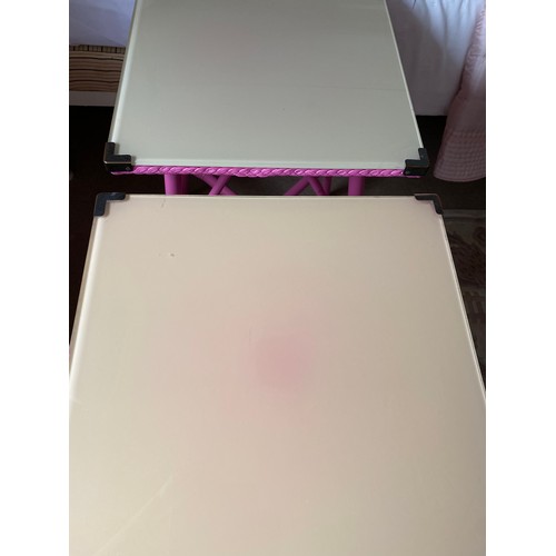 93 - Two fuchsia pink glass top tables. 69 h x 44.5 x 45.5 cm.