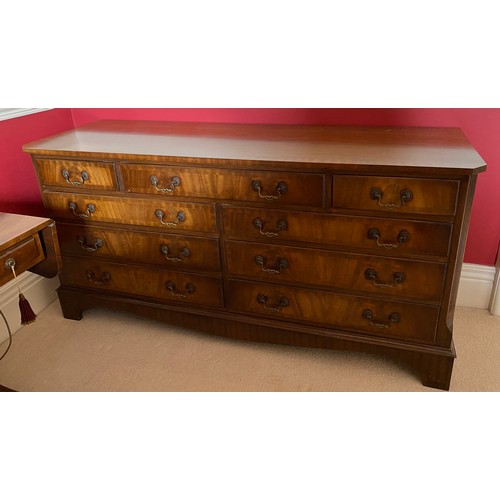 97 - A mahogany 9 drawer chest with reeded corners, bracket feet and brass handle. 152 w x 76 h x 48.5cm ... 