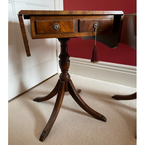 98 - A pair of mahogany 2 drawer drop leaf occasional tables on pedestal bases. 64 h x 46 d x 48cm.