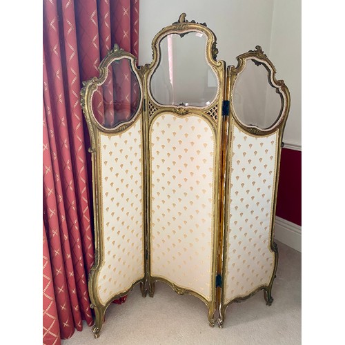 99 - A 19thC three fold gilt dressing screen, fabric panels to base with bevelled glass to top. 165 h x 1... 