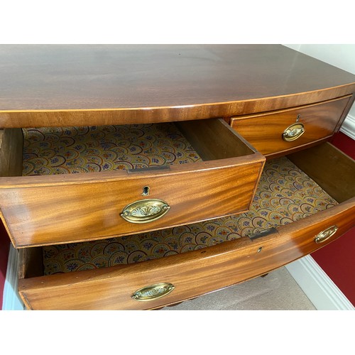 102 - A 19thC mahogany bowfront chest of 2 short over 3 long drawers with brass handles on bracket feet. C... 