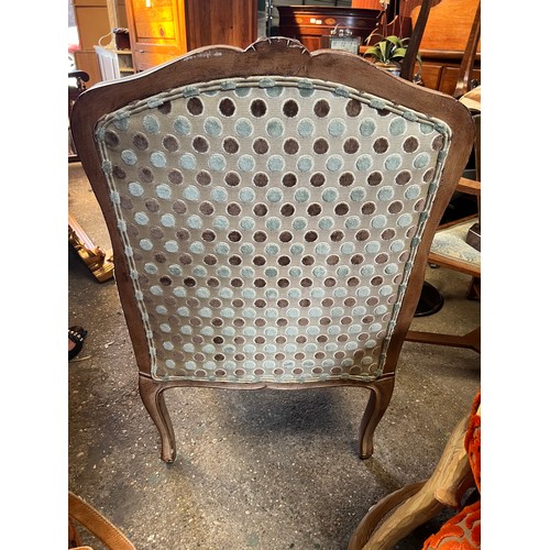 107 - Wooden framed armchair in the French style, upholstered in good quality spotty fabric. 98 h to back ... 